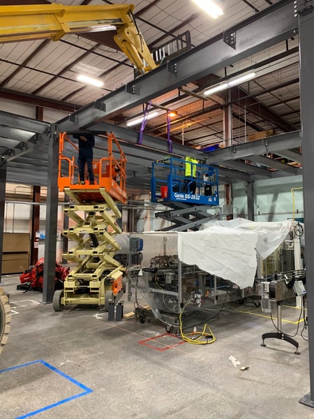 mezzanine construction early stages using electric forklift