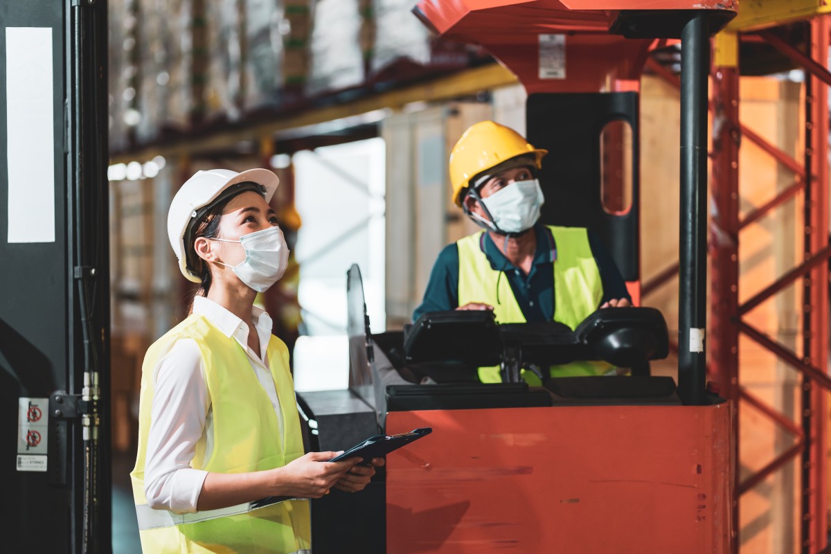 Employees working in warehouse